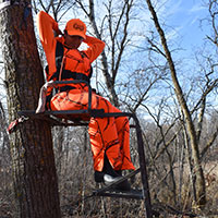 Hunting Safety Bow hunter in a tree stand