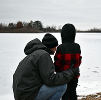 dad and child on ice